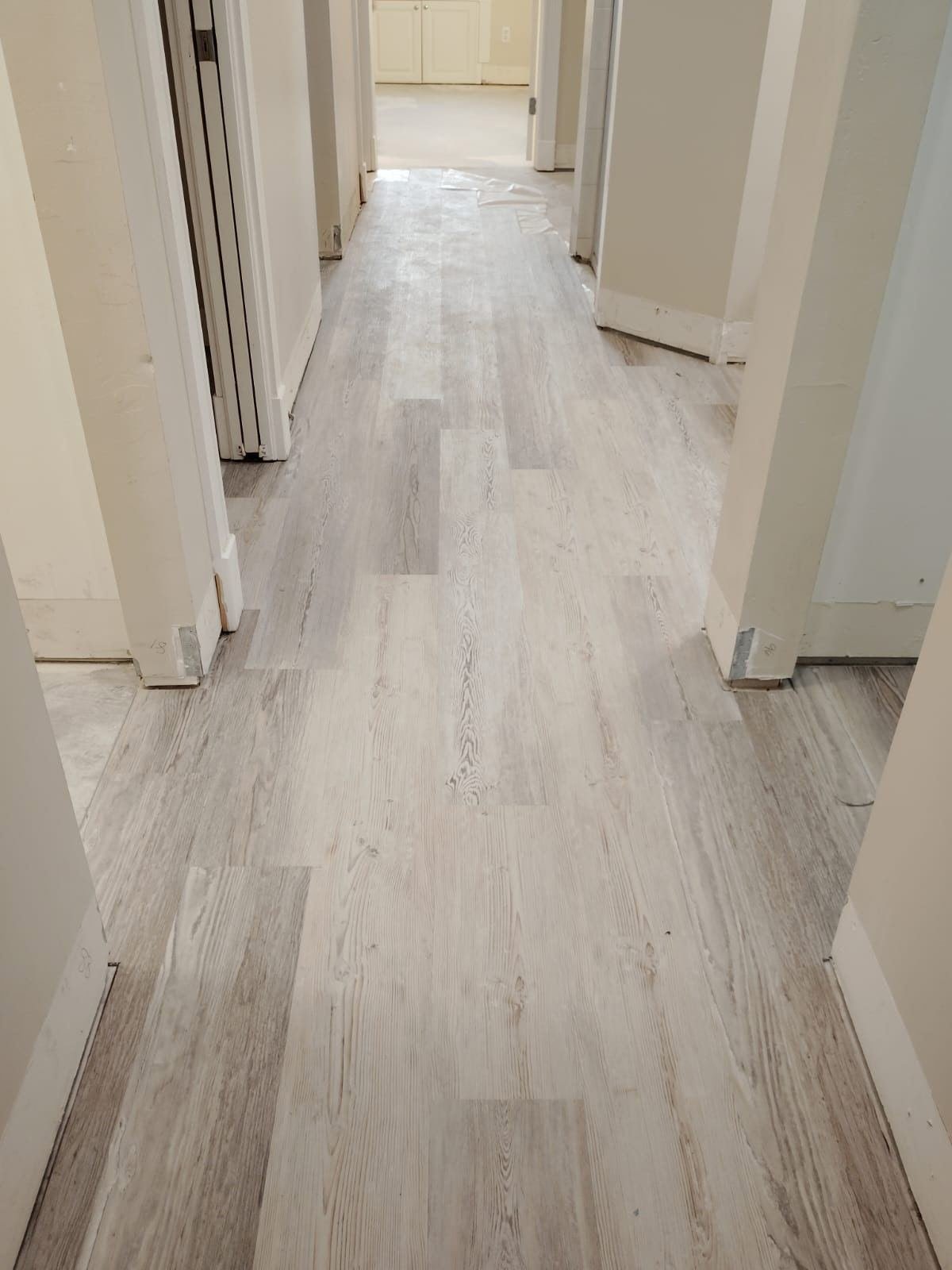 LVP luxury vinyl plank flooring installation in hallway Cape Coral FL